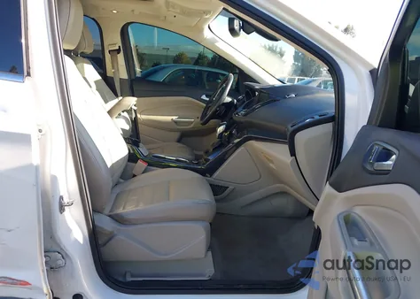 2014 Ford Escape Titanium z USA, uszkodzony, nr VIN 1FMCU0JXXEUD79081